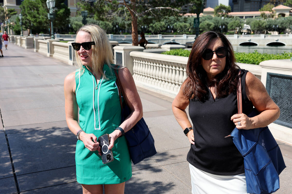 Gina McGinnis of Seattle, left, and Dianna Rom of Ohio talk to a reporter in front of Bellagio ...