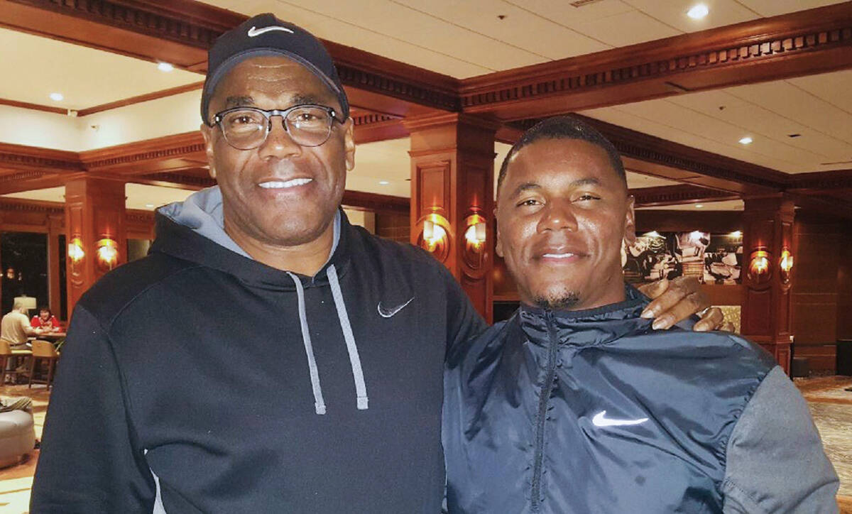 Deland McCullough, right, and his father, Sherman Smith, are shown in 2021. McCullough is now t ...