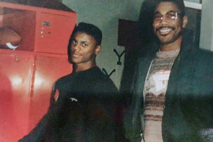 Deland McCullough, left, and his father, Sherman Smith, are shown in 1990, when McCullough made ...