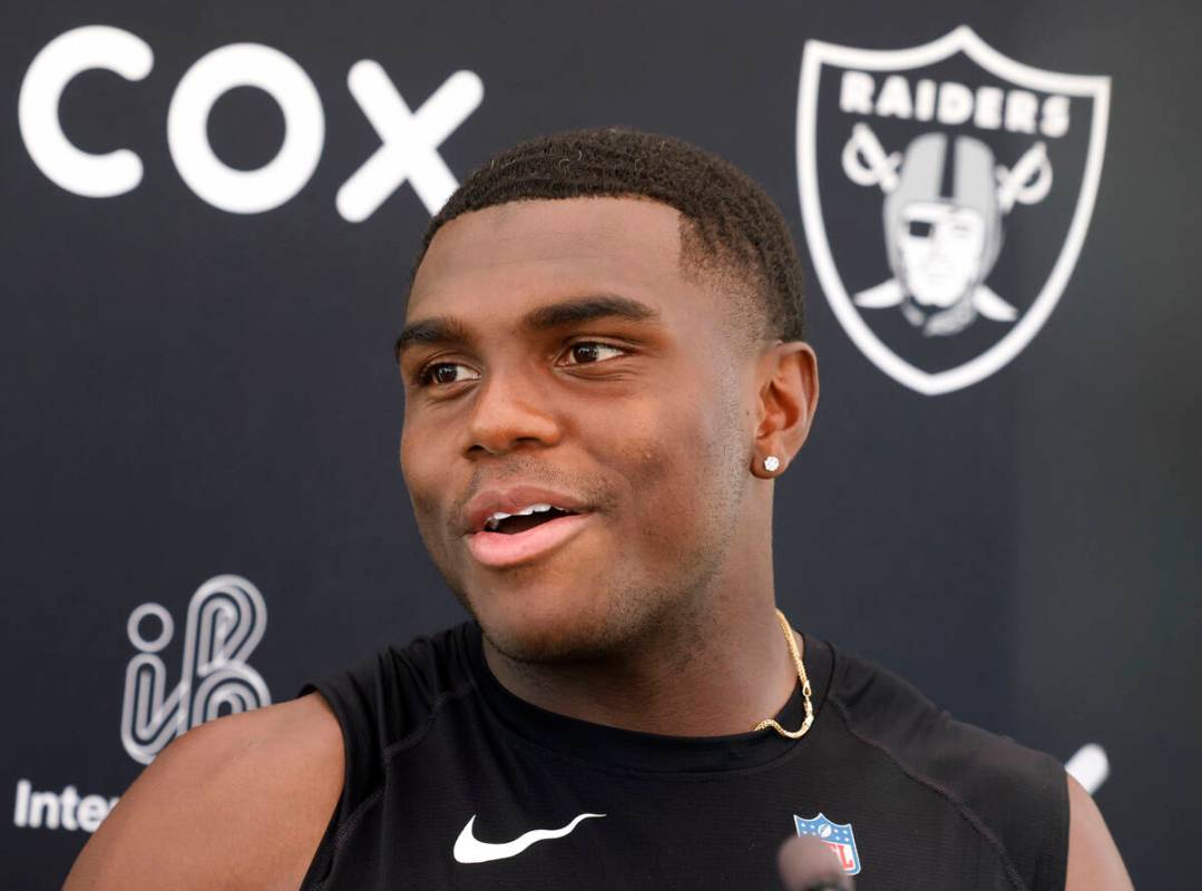 Raiders cornerback Jakorian Bennett addresses the media after participating in an NFL mandatory ...