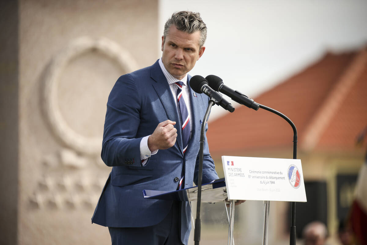 U.S. Defense Secretary Pete Hegseth delivers a speech during the international ceremony commemo ...