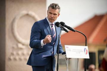 U.S. Defense Secretary Pete Hegseth delivers a speech during the international ceremony commemo ...