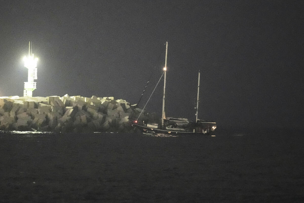 The Gaza-bound aid boat, Madleen, under escort of Israeli naval forces enters to Ashdod Port in ...