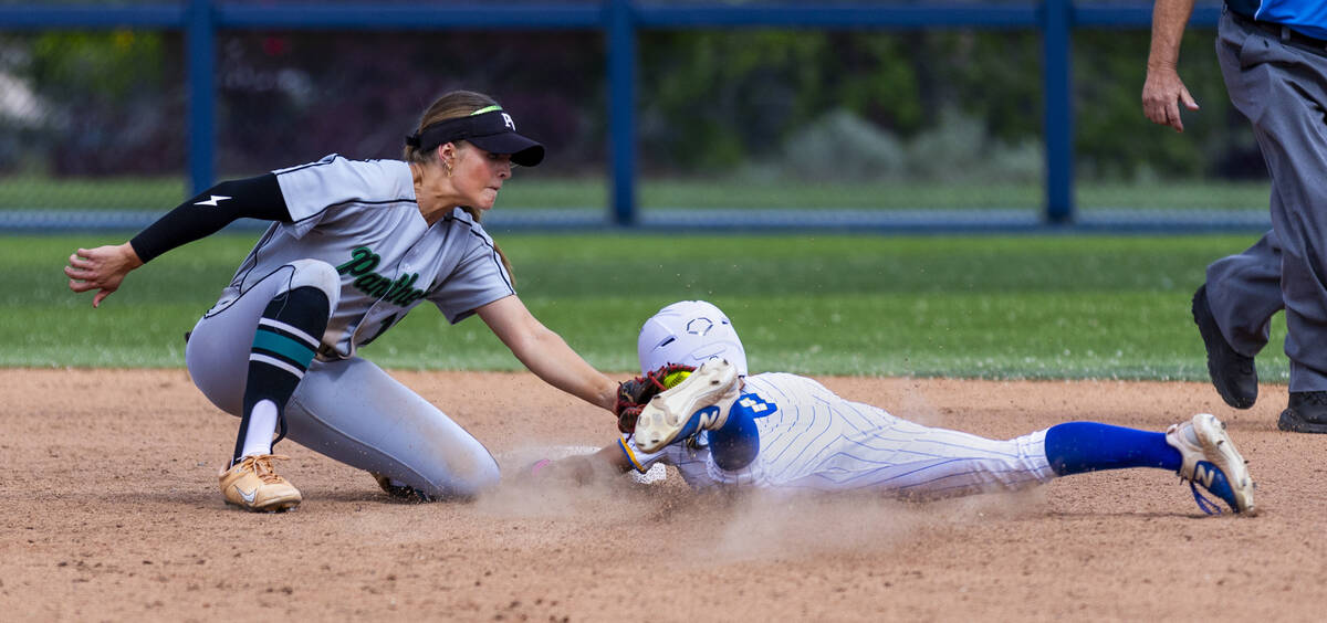 Palo Verde infielder Taylor Johns (11) tags out Reed runner Breanna Staats (9) at second base d ...