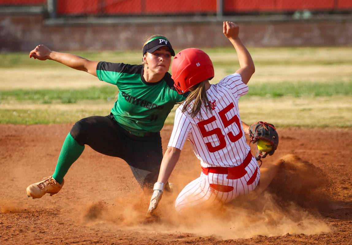 Palo Verde's Taylor Johns (11) tags out Arbor View's Lilly Easton (55) at second base during a ...