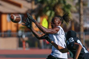 Clark High School wide receiver Dre Pollard makes a catch during a drill at practice on Tuesday ...