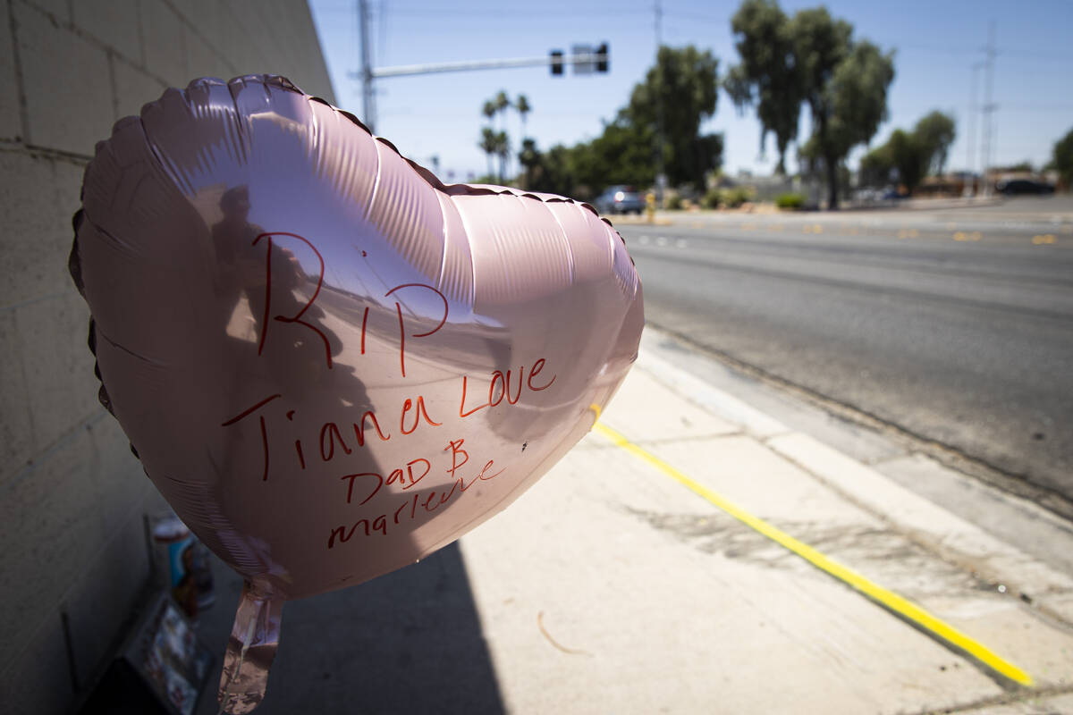 A balloon is left among other items at the scene of a double fatal accident, which occurred the ...