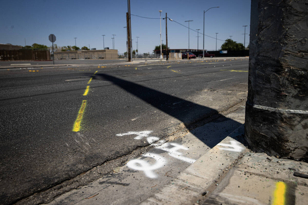 Markings from police are visible at the scene of a double fatal accident, which occurred the ni ...