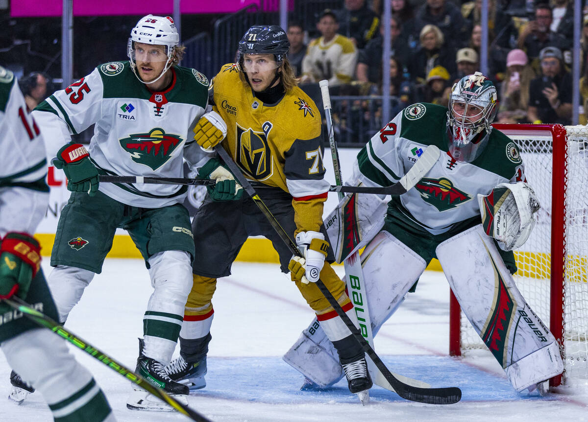Golden Knights center William Karlsson (71) battles for position near the goal against Minnesot ...