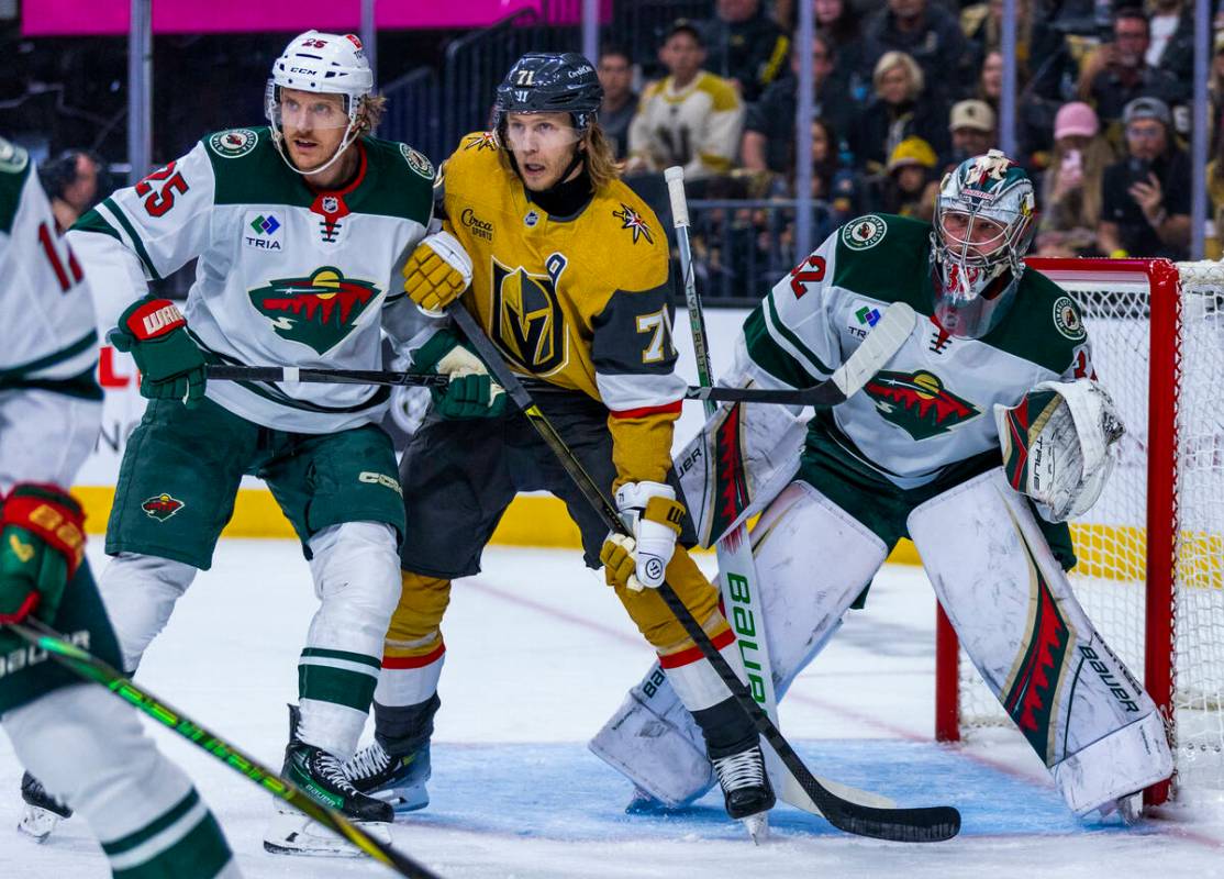 Golden Knights center William Karlsson (71) battles for position near the goal against Minnesot ...
