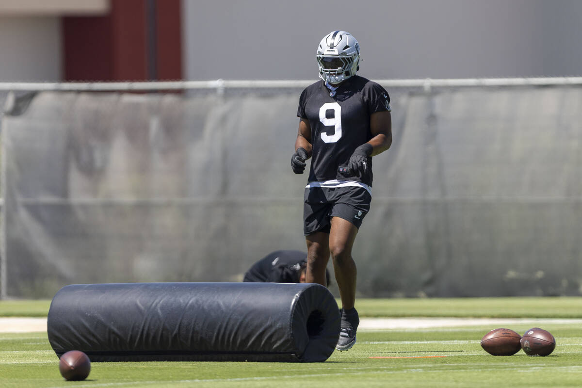 Raiders defensive end Tyree Wilson (9) runs through a drill during an NFL football mandatory mi ...