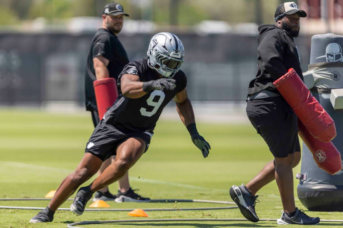 Raiders defensive end Tyree Wilson (9) runs through a drill during an NFL football mandatory mi ...