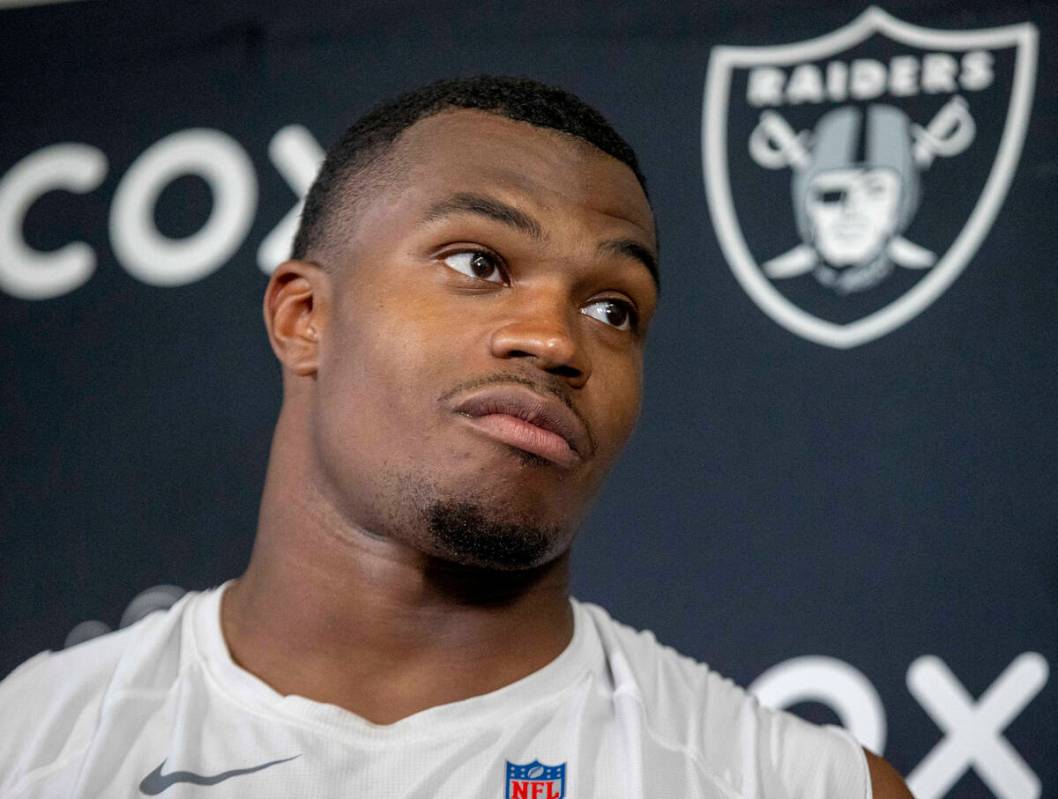 Raiders defensive end Tyree Wilson takes questions during a news conference following an NFL fo ...