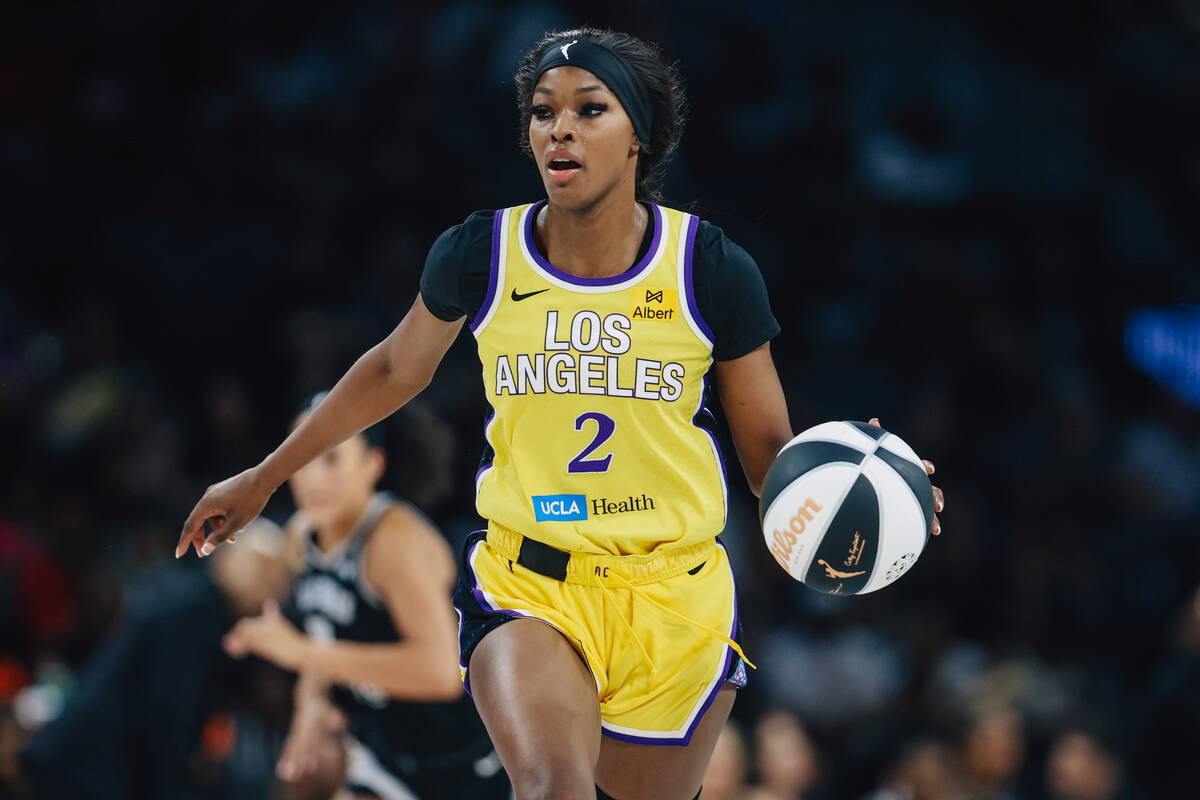 Los Angeles Sparks forward Rickea Jackson dribbles the ball during a WNBA basketball game betwe ...