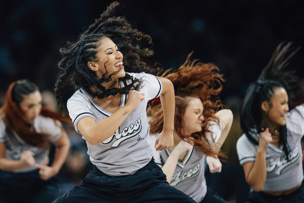 A member of the Wild Card Crew dances during a WNBA basketball game between the Aces and Los An ...