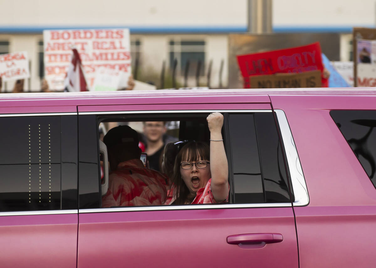 People participate in a protest against ICE on Wednesday, June 11, 2025, in downtown Las Vegas. ...