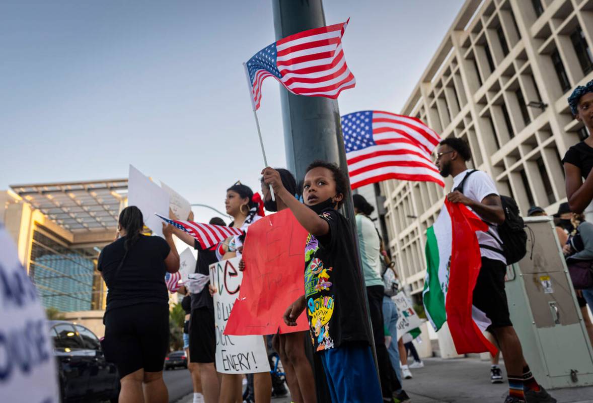 People participate in a protest against ICE on Wednesday, June 11, 2025, in downtown Las Vegas. ...