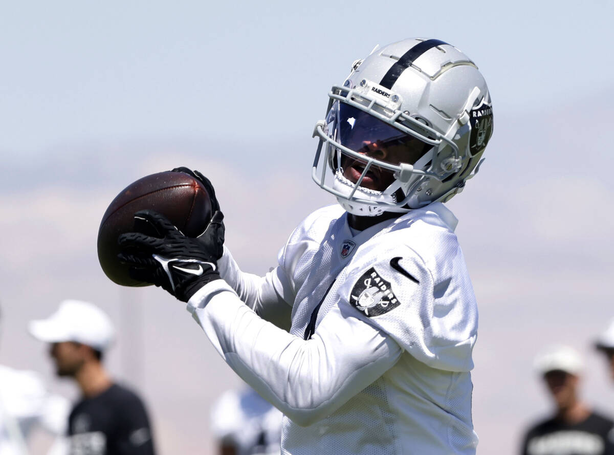 Raiders wide receiver Shedrick Jackson (4) catches the ball during the last day of an NFL manda ...