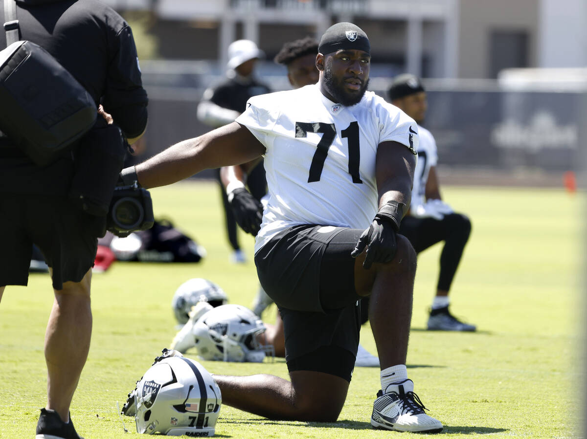 Raiders right tackle DJ Glaze (71) streteches during the last day of an NFL mandatory football ...