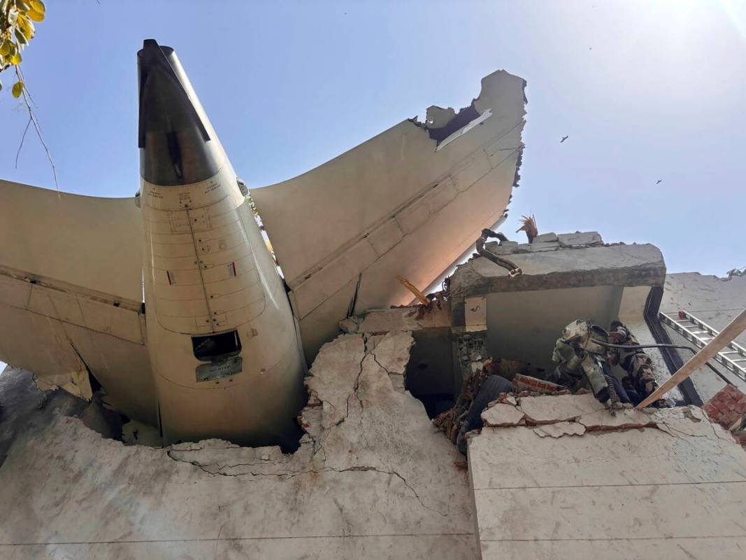 This photo shared by India's Central Industrial Security Force (CISF) shows debris of a plane t ...