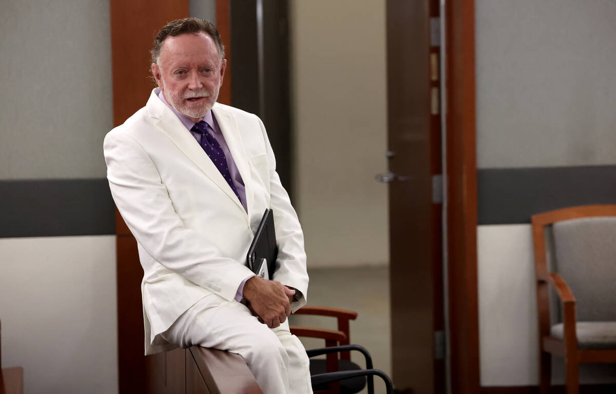 Attorney Robert Langford waits to appear in court on behalf of his client, former Clark County ...