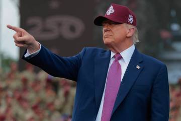 U.S. President Donald Trump takes the stage during a rally with U.S. Army troops on Tuesday, Ju ...