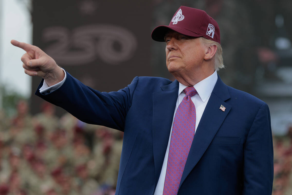 U.S. President Donald Trump takes the stage during a rally with U.S. Army troops on Tuesday, Ju ...