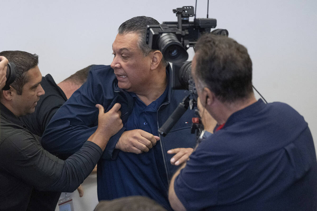 U.S. Sen. Alex Padilla, D-Calif., is pushed out of the room as Homeland Security Secretary Kris ...
