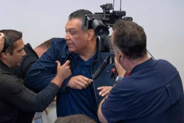 U.S. Sen. Alex Padilla, D-Calif., is pushed out of the room as Homeland Security Secretary Kris ...