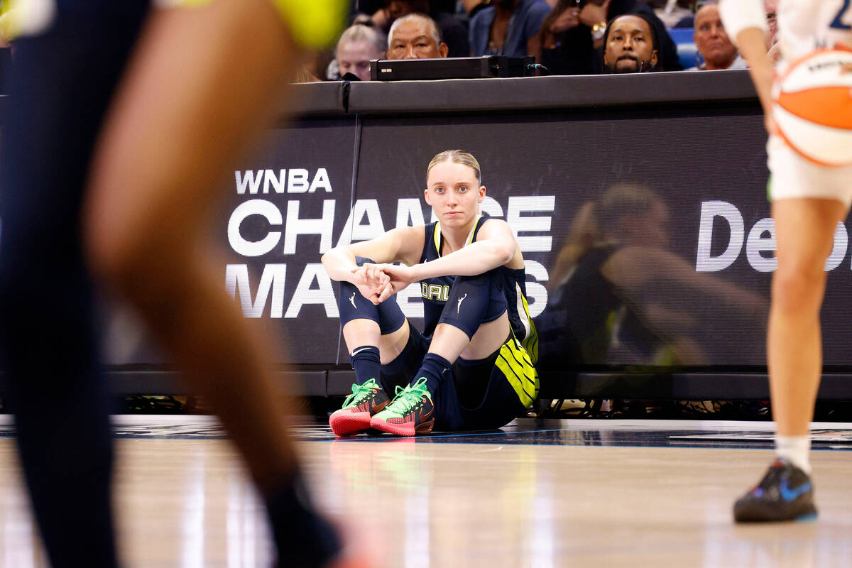 Dallas Wings guard Paige Bueckers (5) waits to return to the court during the second half of an ...