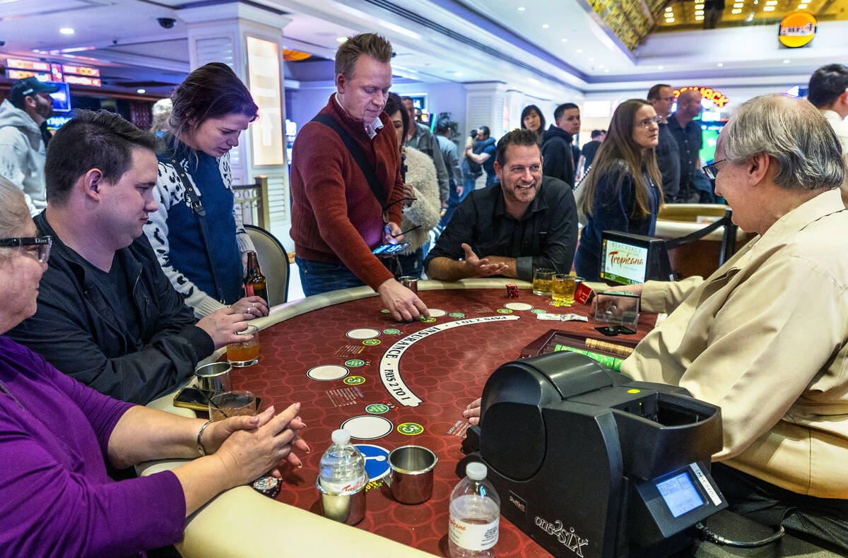The last hand of blackjack is played and chips collected during the final night of gaming at th ...