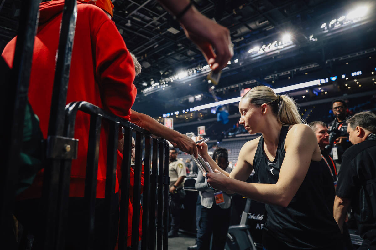 Dallas Wings guard Paige Bueckers greets fans before facing off in a WNBA basketball game betwe ...