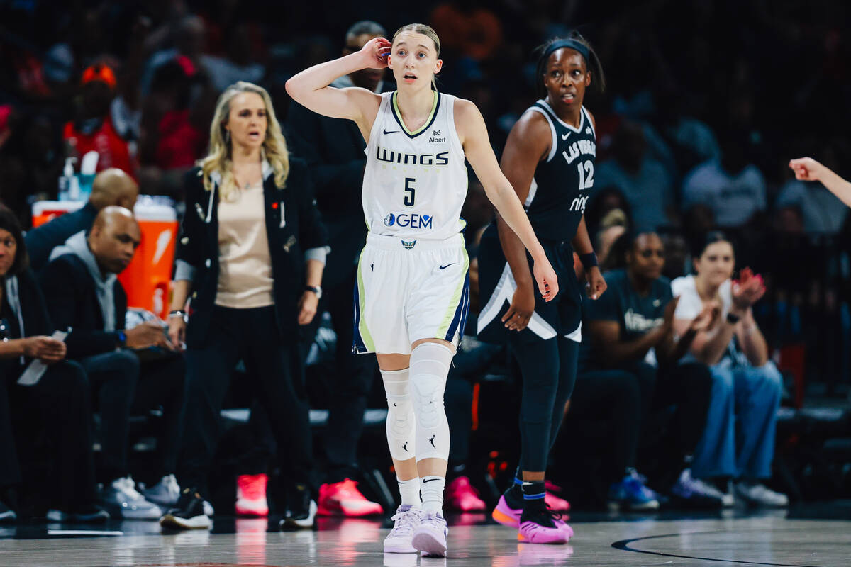 Dallas Wings guard Paige Bueckers reacts as her team is down during a WNBA basketball game betw ...