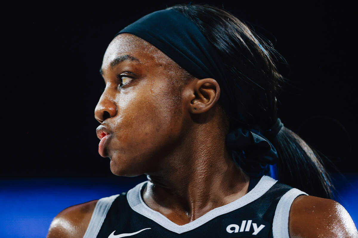 Las Vegas Aces guard Jackie Young looks to the side during a WNBA basketball game between the A ...