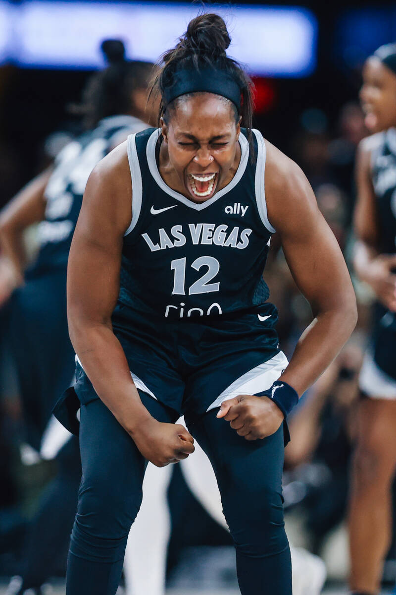 Las Vegas Aces guard Chelsea Gray (12) celebrates during a WNBA basketball game between the Ace ...