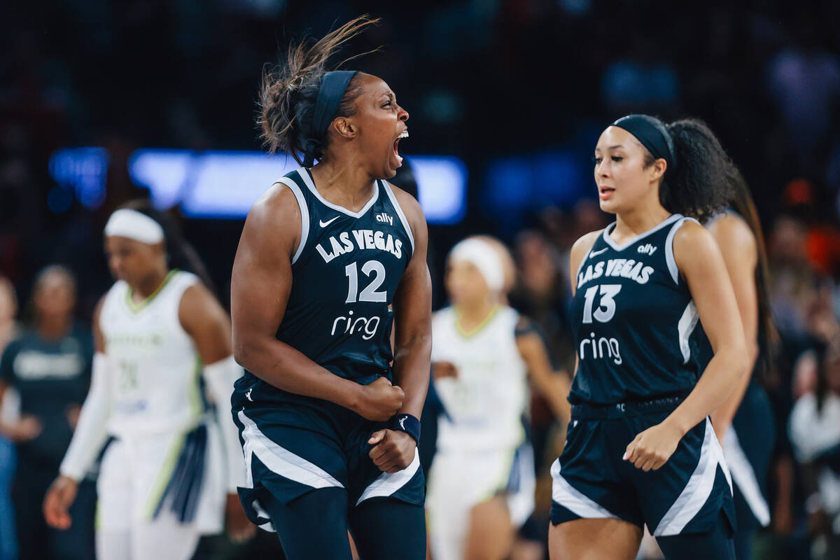 Las Vegas Aces guard Chelsea Gray (12) celebrates during a WNBA basketball game between the Ace ...