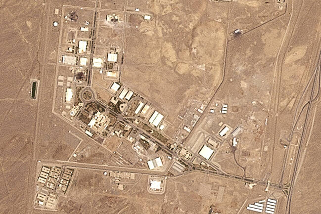 This satellite image from Planet Labs PBC shows the Natanz nuclear enrichment site in Iran afte ...