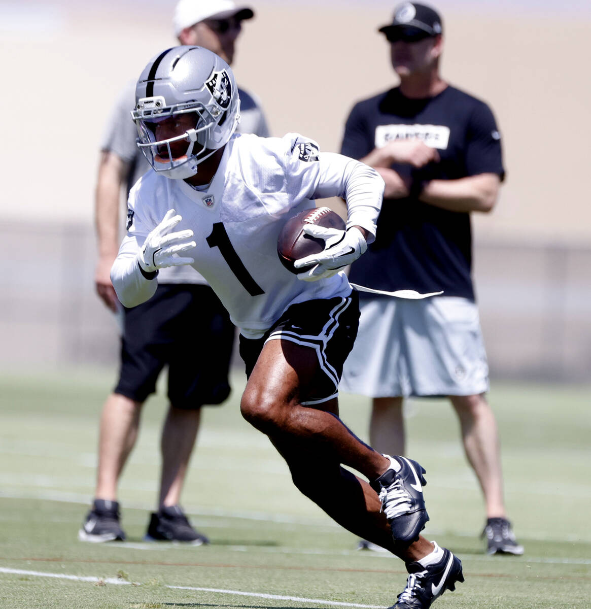 Raiders wide receiver Tre Tucker (1) runs with the ball during an NFL mandatory football minica ...