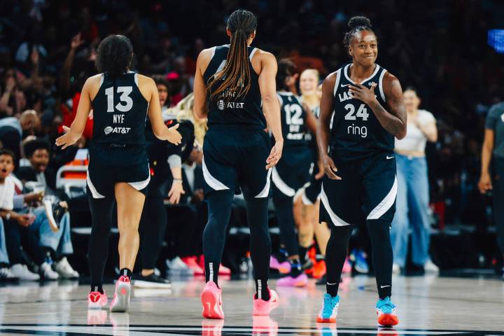 Las Vegas Aces guard Jewell Loyd (24) reacts to a three pointer that she made during a WNBA bas ...