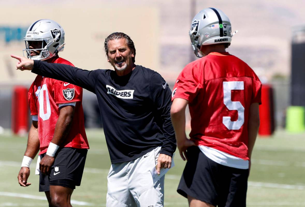 Raider quarterback Cam Miller (5) listens to quarterbacks coach Greg Olson during the 2025 rook ...