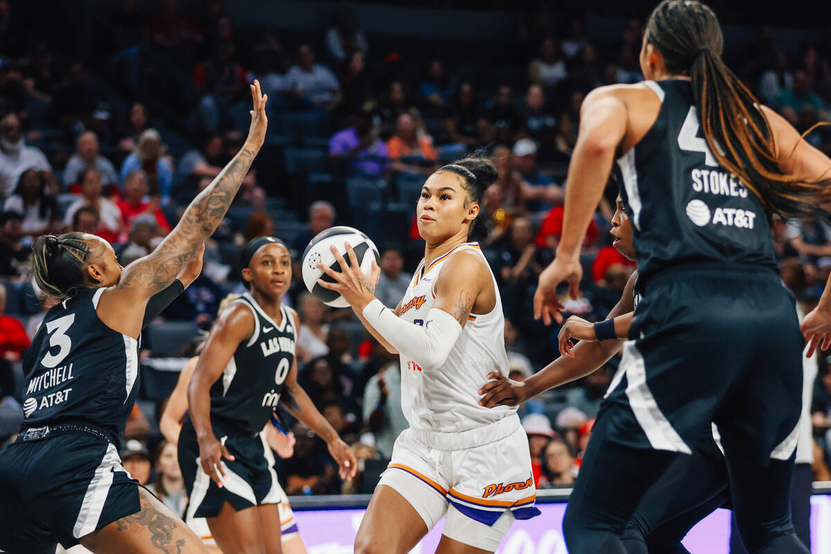 Phoenix Mercury forward Satou Sabally (0) drives the ball to the net during a WNBA basketball g ...