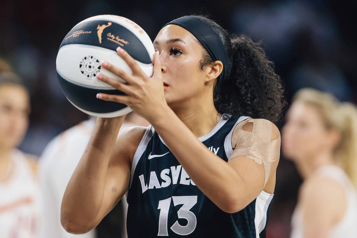 Aces guard Aaliyah Nye (13) shoots a free throw during a WNBA basketball game between the Aces ...