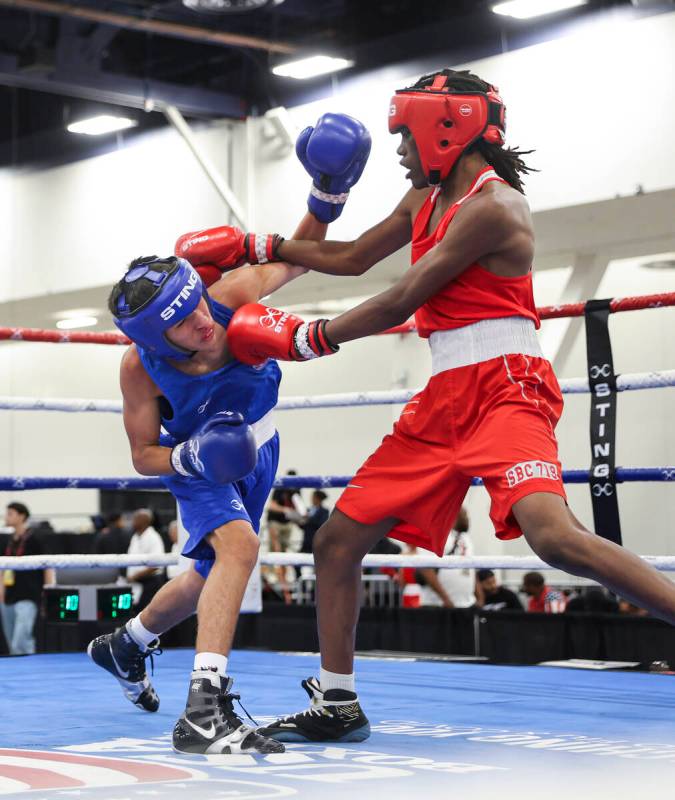 Noel Vega, of Lake Placid, Fla., competes against Jerone Penrose, of Colorado Springs, Colo., d ...