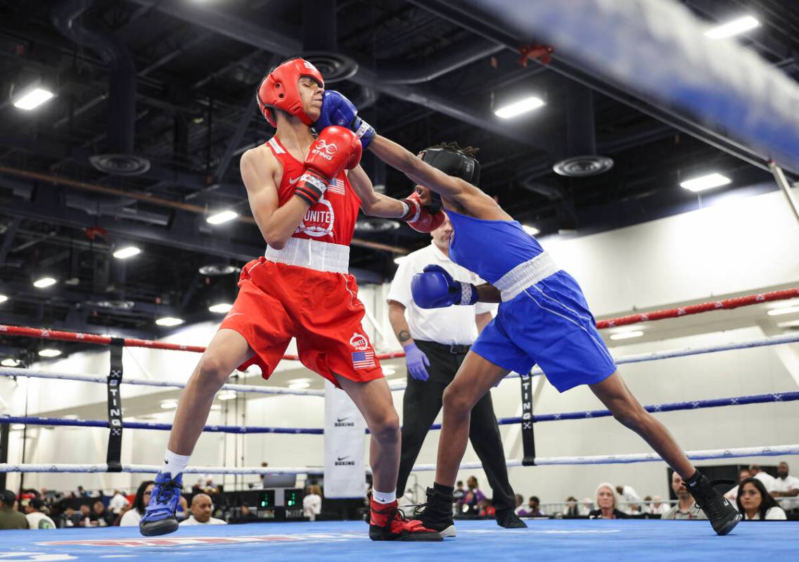 Da'traylen Frank, of Lafayette, La., right, connects with Aaron Pineda Arias, of Reading, Pa., ...