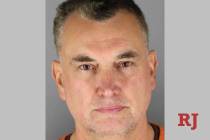This booking photo provided by the Hennepin County Sheriff's Office shows Vance Boelter in Gree ...