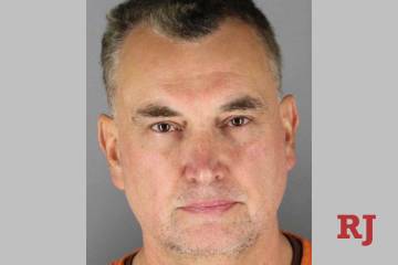 This booking photo provided by the Hennepin County Sheriff's Office shows Vance Boelter in Gree ...