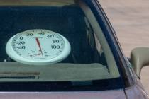 A thermometer rerads 148.6 degrees during a reenactment of a 911 response to a child left in a ...
