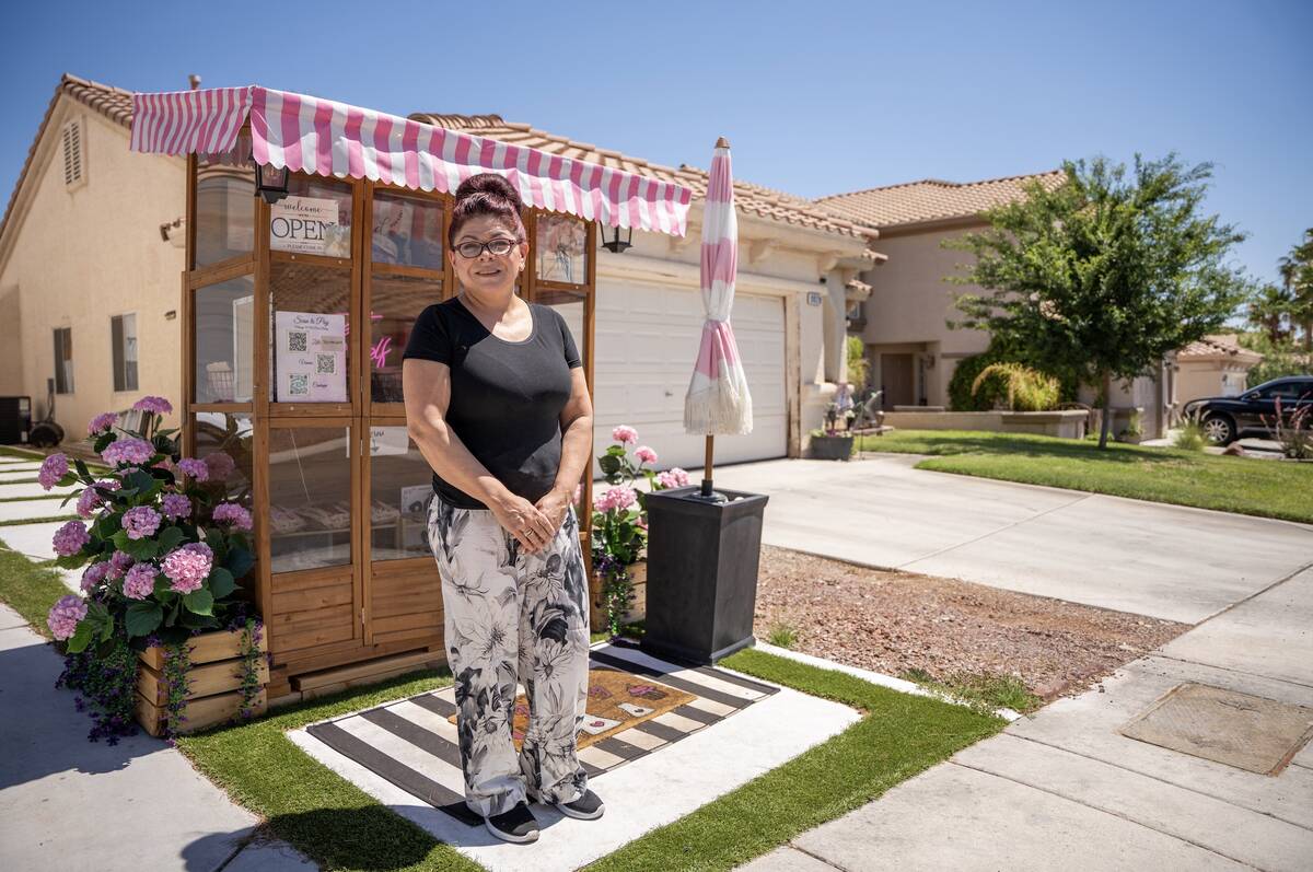 Aida Serrano stands in front of Mommy n Me Porch Bakery, a stand she operates outside her home ...