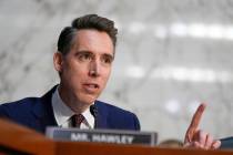Sen. Josh Hawley, R-Mo., speaks during a confirmation hearing at the Capitol in Washington, Jan ...