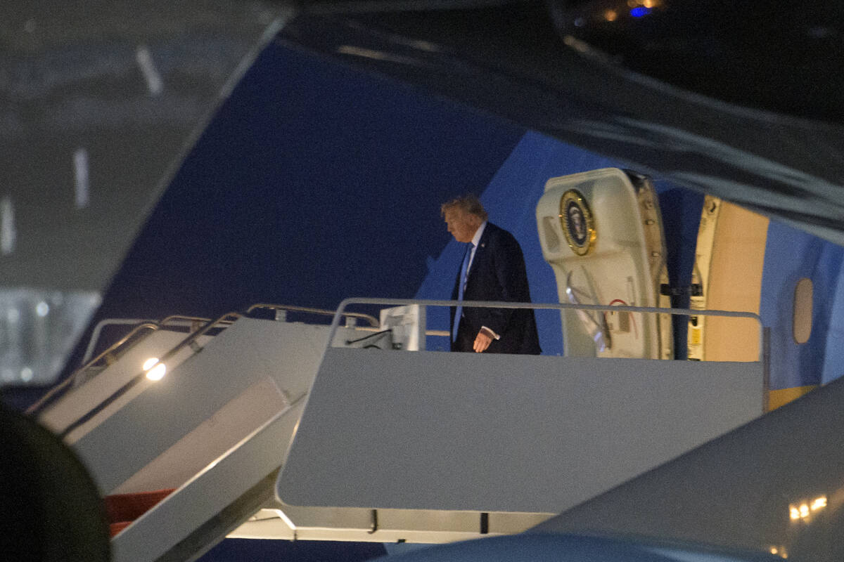 President Donald Trump arrives on Air Force One at Joint Base Andrews, Md., Tuesday, June 17, 2 ...